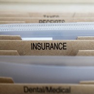 Labeled File Folders --- Image by © Russell Underwood/Corbis